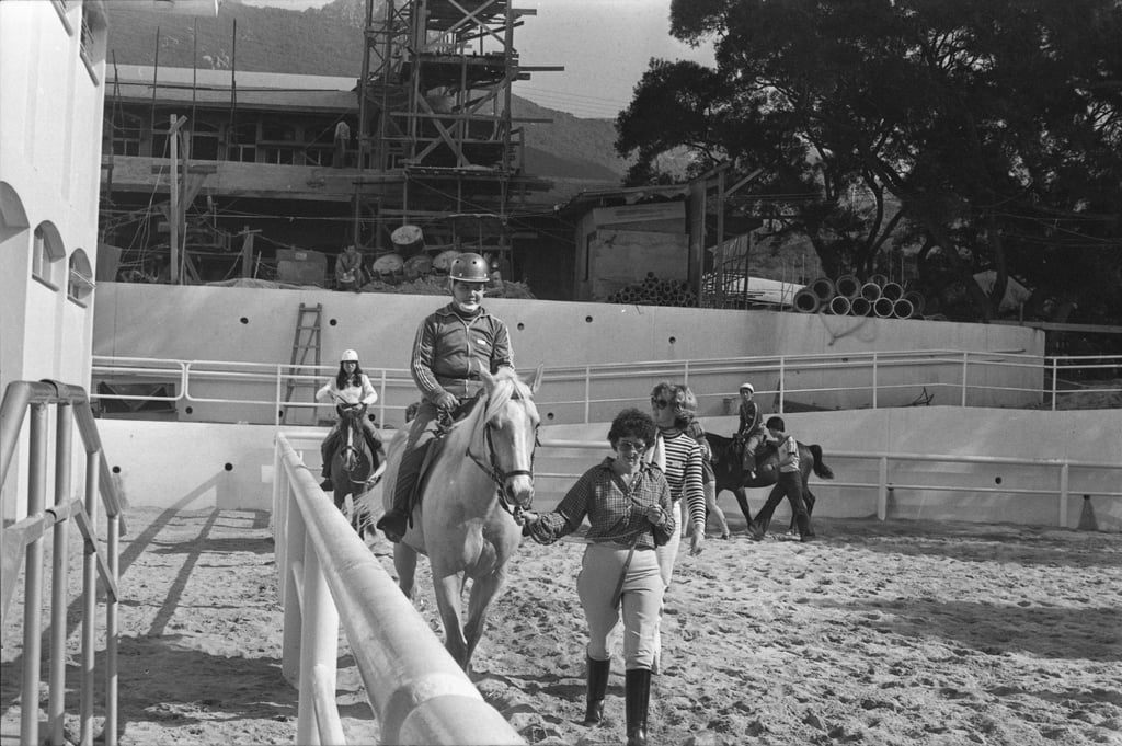 Disabled and non-disabled riders at the Pok Fu Lam school in 1978. The sessions are designed to help restore co-ordination and mobility in physically disabled riders. Photo: SCMP Archives