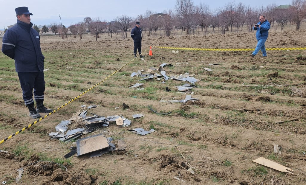 Azeri security forces guard the remains of an Iranian drone near a school in the Nakhchivan Autonomous Republic on Thursday. Photo: Azerbaijan State News Agency/Xinhua
