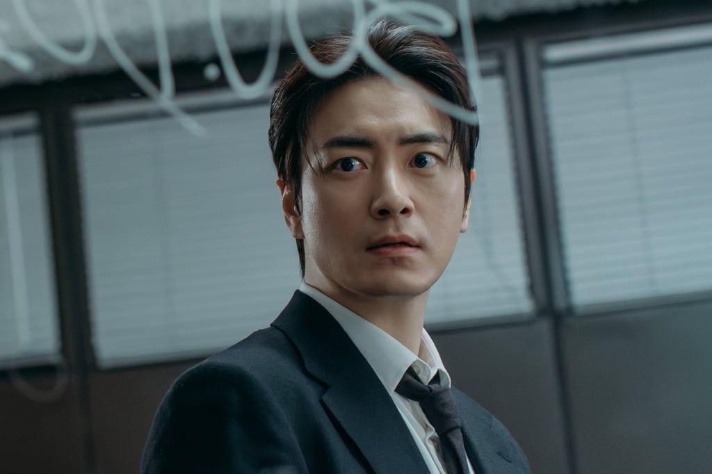 Lee Joon-hyuk in a still from the 2026 mystery K-drama The Art of Sarah. Photo: Netflix
