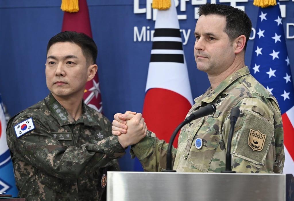 Colonel Jang Do-young (left), public affairs director of South Korea’s Joint Chiefs of Staff, and Colonel Ryan Donald, public affairs director of the United States Forces Korea, pose for a photo during a Freedom Shield press briefing on February 25. Photo: EPA Colonel Jang Do-young (left), public affairs director of South Korea’s Joint Chiefs of Staff, and Colonel Ryan Donald, public affairs director of the United States Forces Korea, pose for a photo during a Freedom Shield press briefing on February 25. Photo: EPA