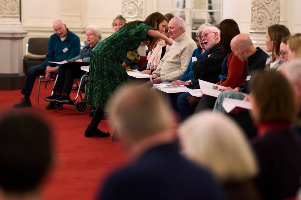 People, many of them seniors with a form of dementia, take part in the ‘singing circle’ run by opera singer Maartje de Lint at the Concertgebouw concert hall in Amsterdam. Photo: AP