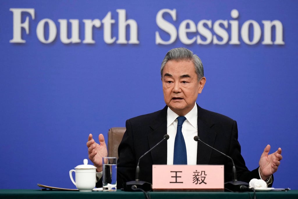 China’s top diplomat Wang Yi speaks to the press about Beijing’s foreign policy objectives during the “two sessions” in Beijing on March 8. Photo: AFP