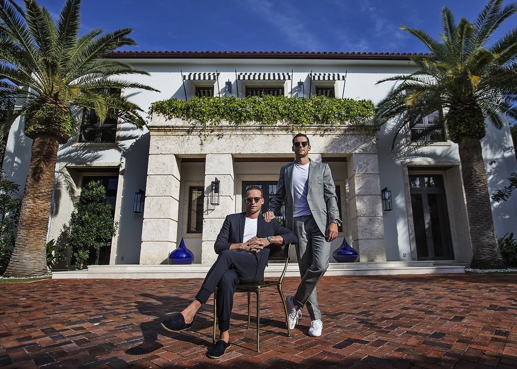 Real estate brokers Tal Alexander and Oren Alexander at their home on Miami Beach in 2019. File photo: TNS