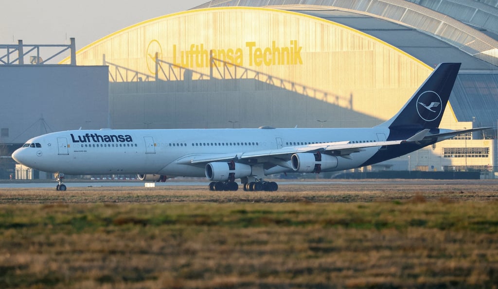 A Lufthansa plane carrying German tourists evacuated from the Middle East arrives from Muscat on Thursday. Photo: Reuters