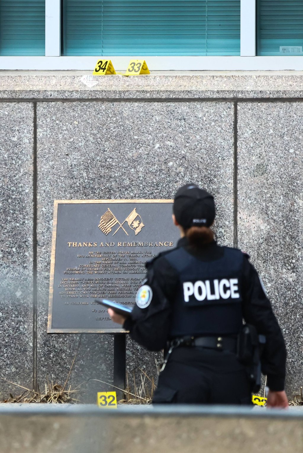 A police officer works at the scene of a shooting at the US consulate in Toronto, Canada, on Tuesday. Photo: AFP