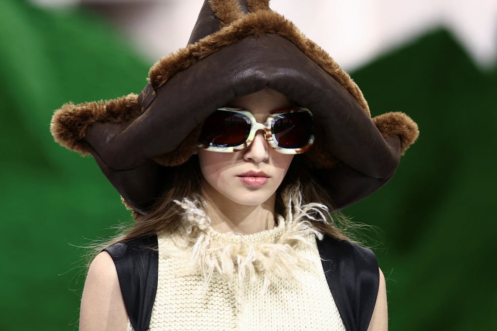 The looks were accessorised with furry hats. Photo: Reuters