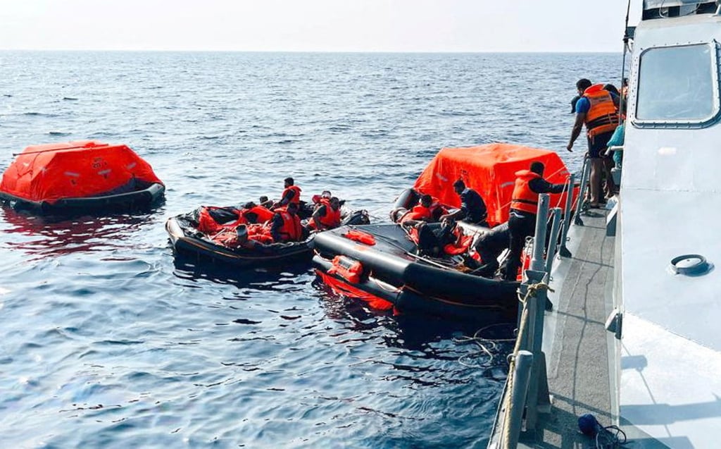 Sri Lanka Navy personnel assist Iranian sailors from the IRIS Dena after responding to a distress call on March 4. Photo: Sri Lanka Navy/Reuters