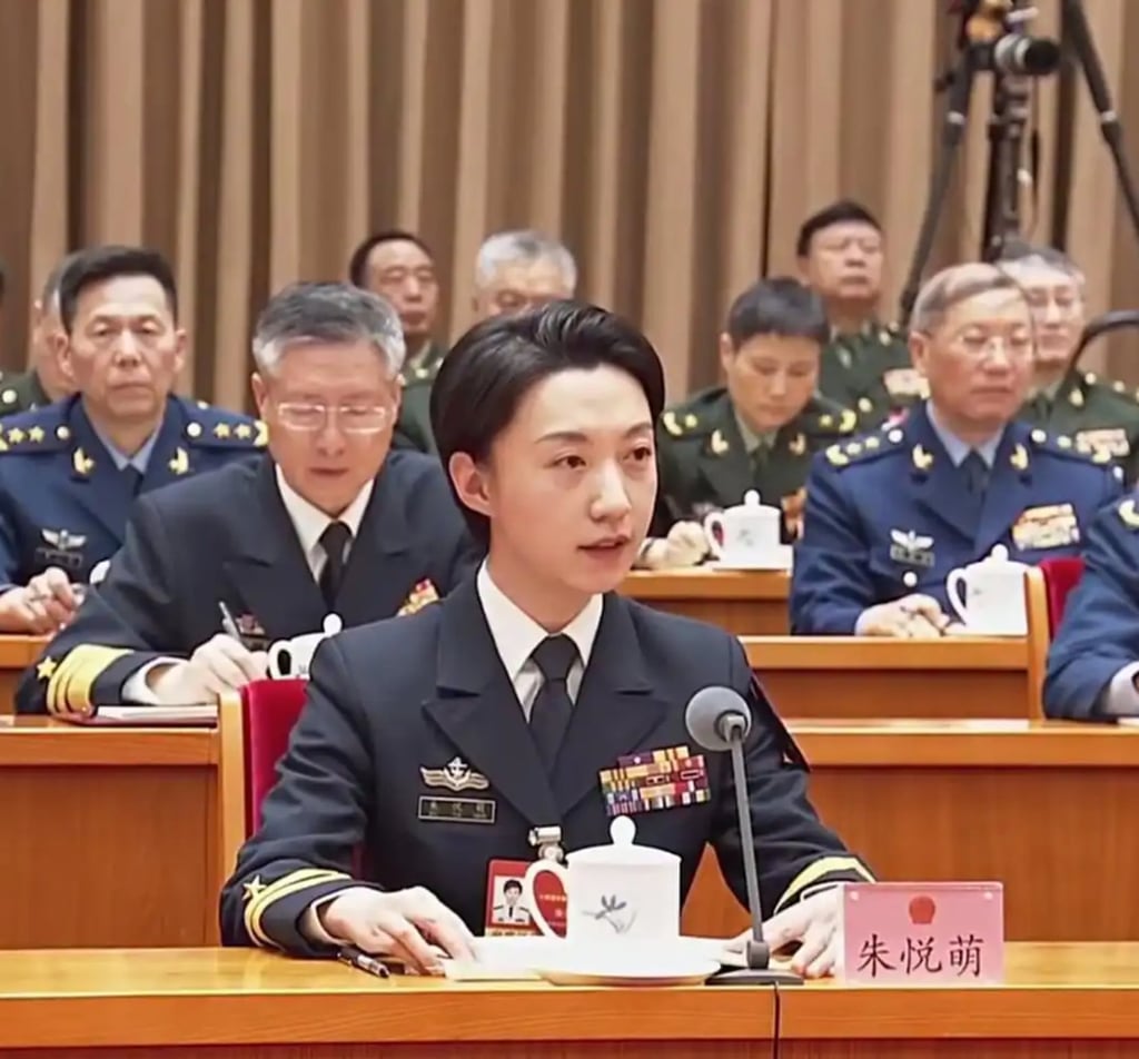 Zhu Yuemeng takes part in a meeting alongside her fellow military officers. Photo: Baidu