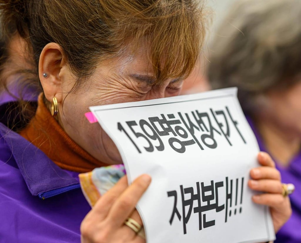 A victim’s family member bursts into tears during an investigative hearing into the 2022 Itaewon Disaster on Thursday. Photo: The Korea Times