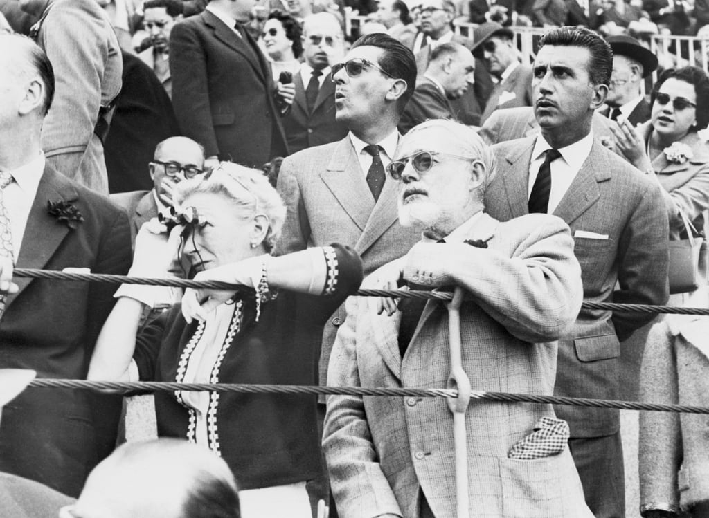 Author Ernest Hemingway (front) and his wife Mary (with binoculars) at a bullfight in Madrid, in 1959. Photo: Getty Images Author Ernest Hemingway (front) and his wife Mary (with binoculars) at a bullfight in Madrid, in 1959. Photo: Getty Images