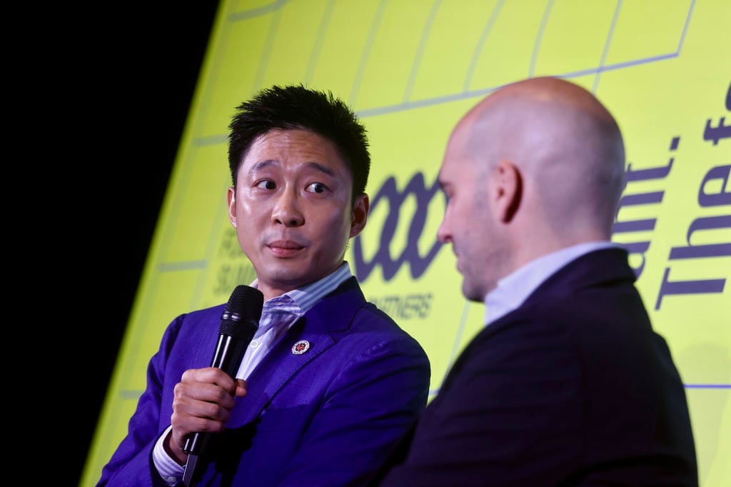 Eric Fok, pictured at last year's FIFA World Cup, says participating in the Asian Games will benefit Hong Kong football. Photo: Jonathan Wong