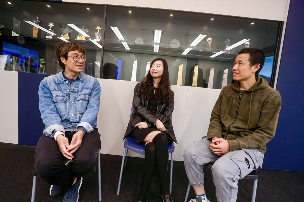 (From left) Kong Yiu-wing, the SCMP’s Karen Cheung and Hu Anyan chat at the SCMP’s offices in Times Square, Hong Kong. Photo: Jonathan Wong