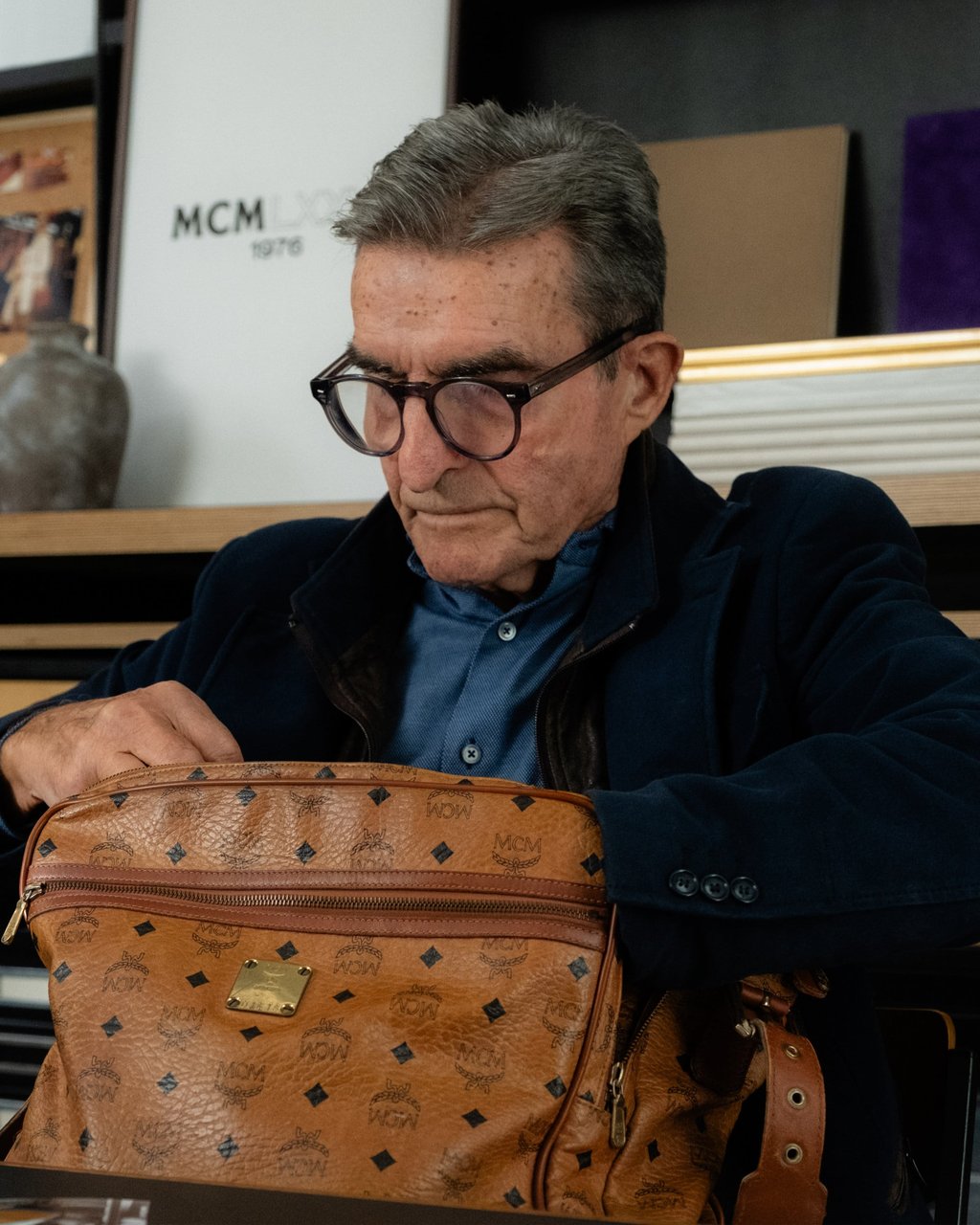 Heritage brand ambassador and early team member Herbert Lieb with a vintage MCM piece. Photo: Handout