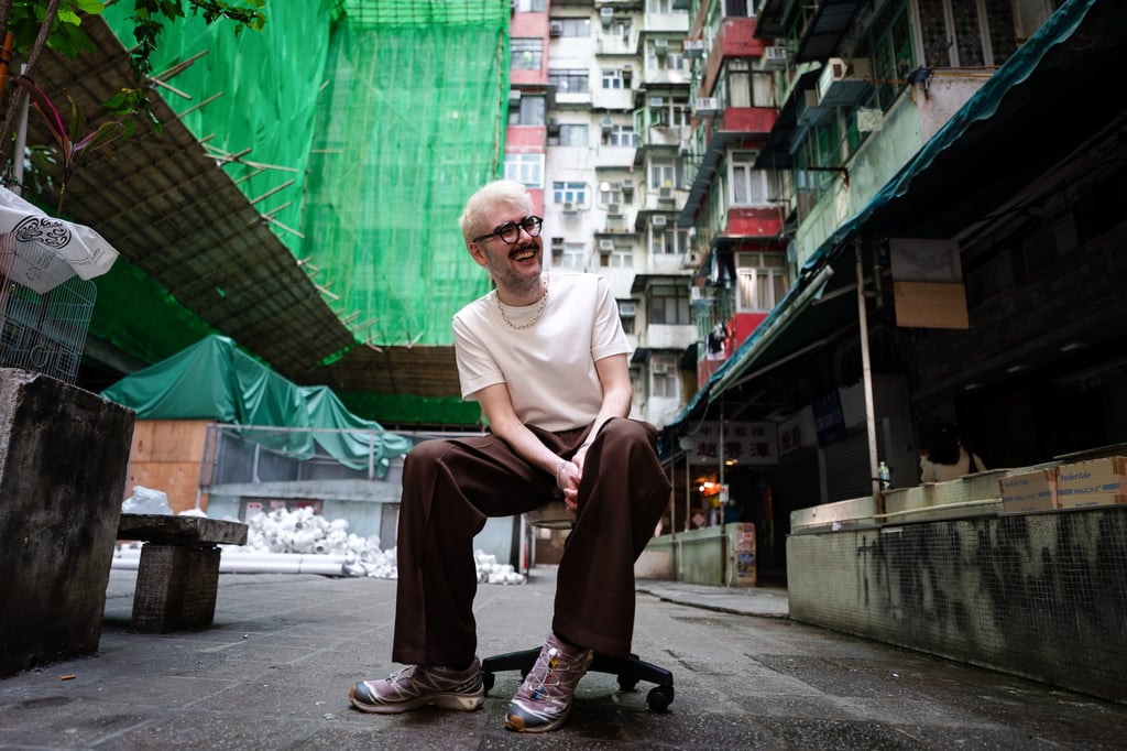James Taylor-Foster in front of Yick Cheong Building, aka the “Monster Building”, in Quarry Bay. Unlike his predecessor Billy Tang, Para Site’s new executive director Taylor-Foster is not well known in the local art circle. Photo: Elson Li