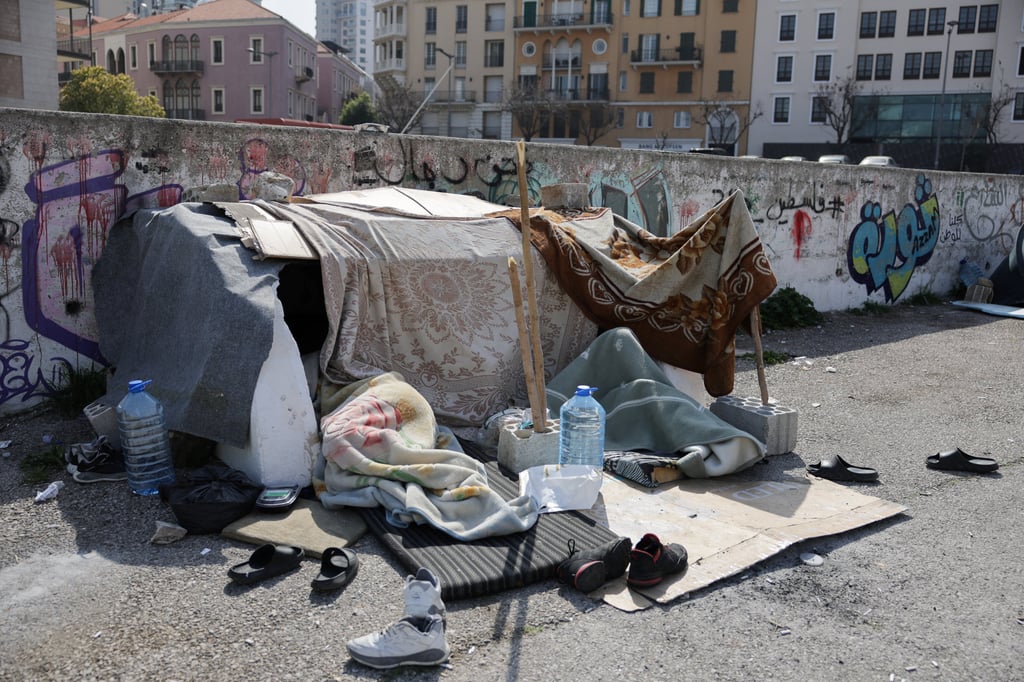 Displaced people rest at a roadside tent, following an escalation between Hezbollah and Israel, in Beirut, Lebanon, on Friday. Photo: Reuters Displaced people rest at a roadside tent, following an escalation between Hezbollah and Israel, in Beirut, Lebanon, on Friday. Photo: Reuters