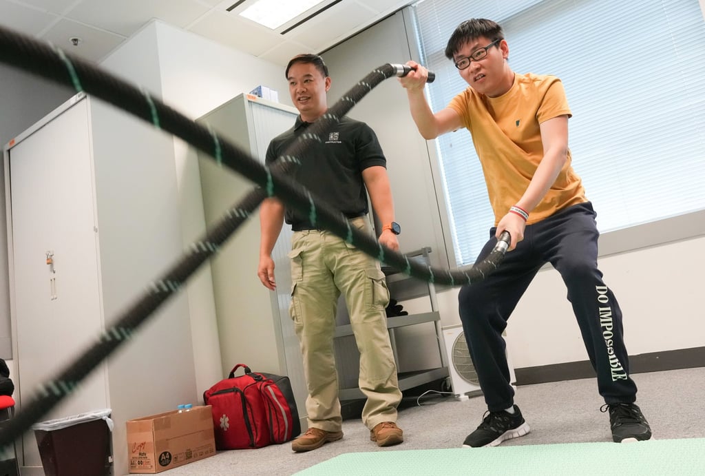 A potential recruit undergoes a physical test at the learning event. Photo: Karma Lo