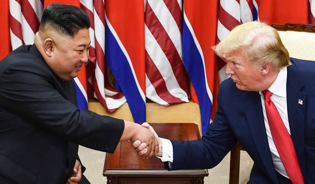 Kim Jong-un (left) and Donald Trump shake hands during a meeting on the south side of the military demarcation line that divides North and South Korea on June 30, 2019. Photo: AFP