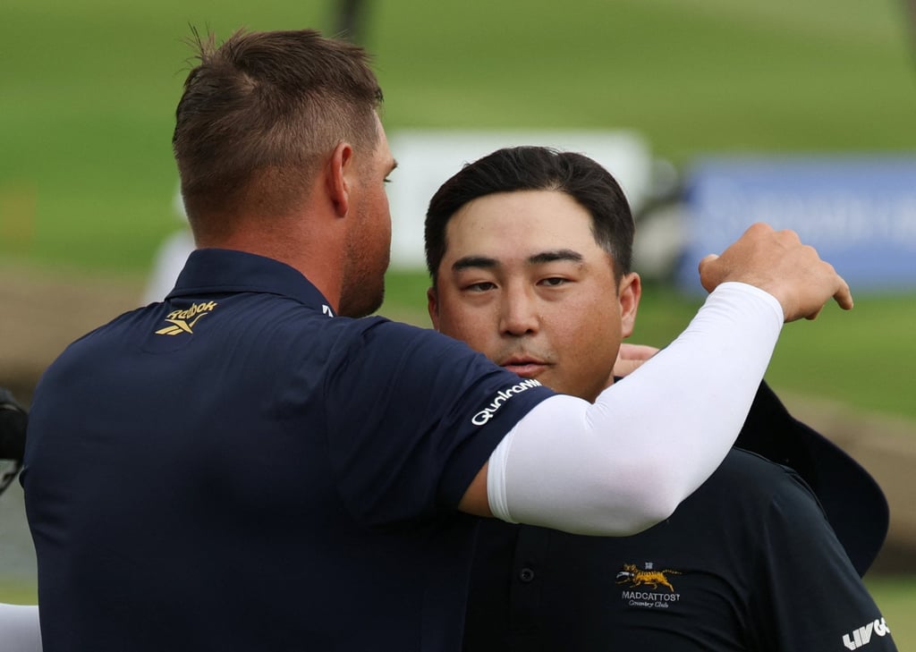 Bryson DeChambeau (left) consoles second-placed Richard T Lee after the play-off. Photo: Reuters