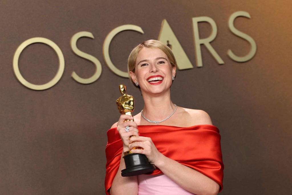Jessie Buckley poses in the press room with her Oscar for best actress in a leading role for Hamnet. Photo: AFP