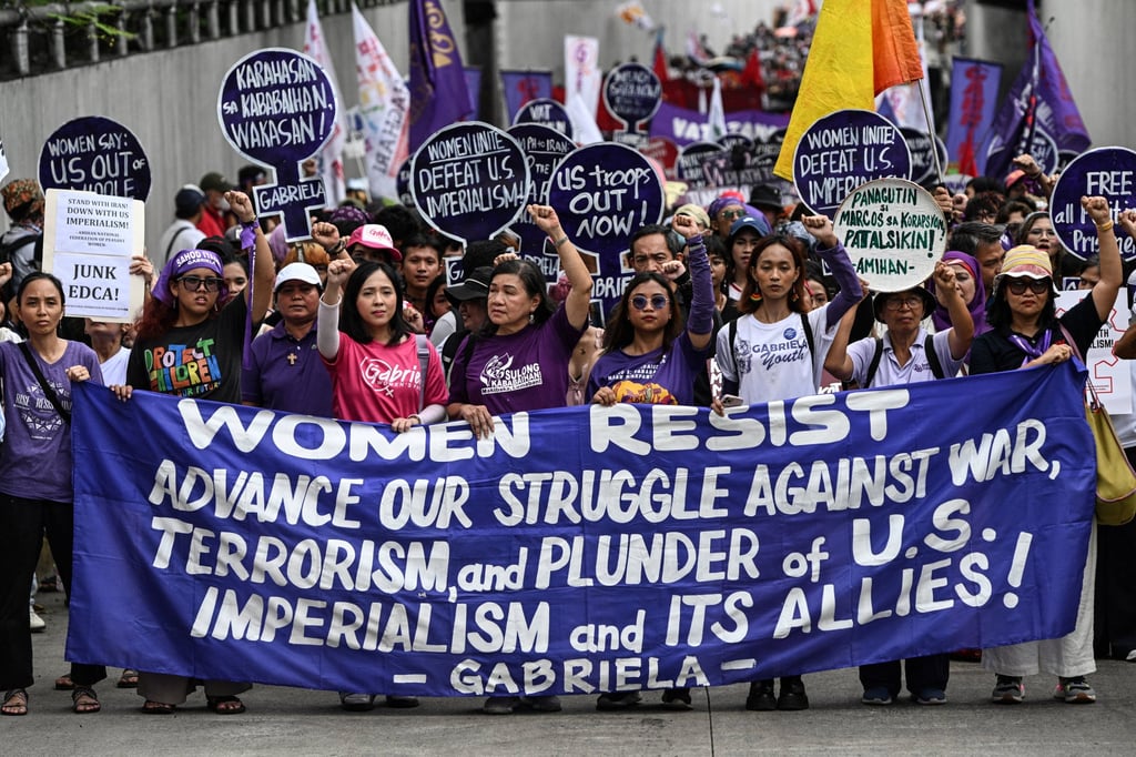 A protest to commemorate International Women’s Day is held in Manila, the Philippines, on March 8. Photo: Reuters