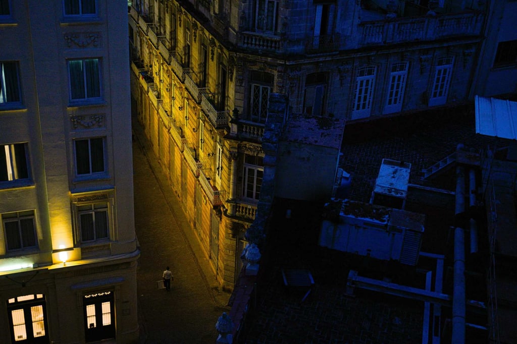 A hotel in Havana remains lit by its own system during a blackout. Photo: AFP