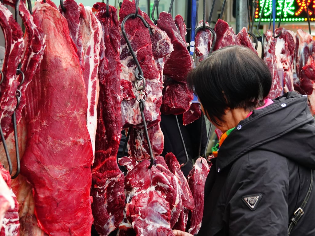 Hanging beef for sale at a market in China. Hundreds of people have signed up for the initiative. Photo: Getty Images Hanging beef for sale at a market in China. Hundreds of people have signed up for the initiative. Photo: Getty Images