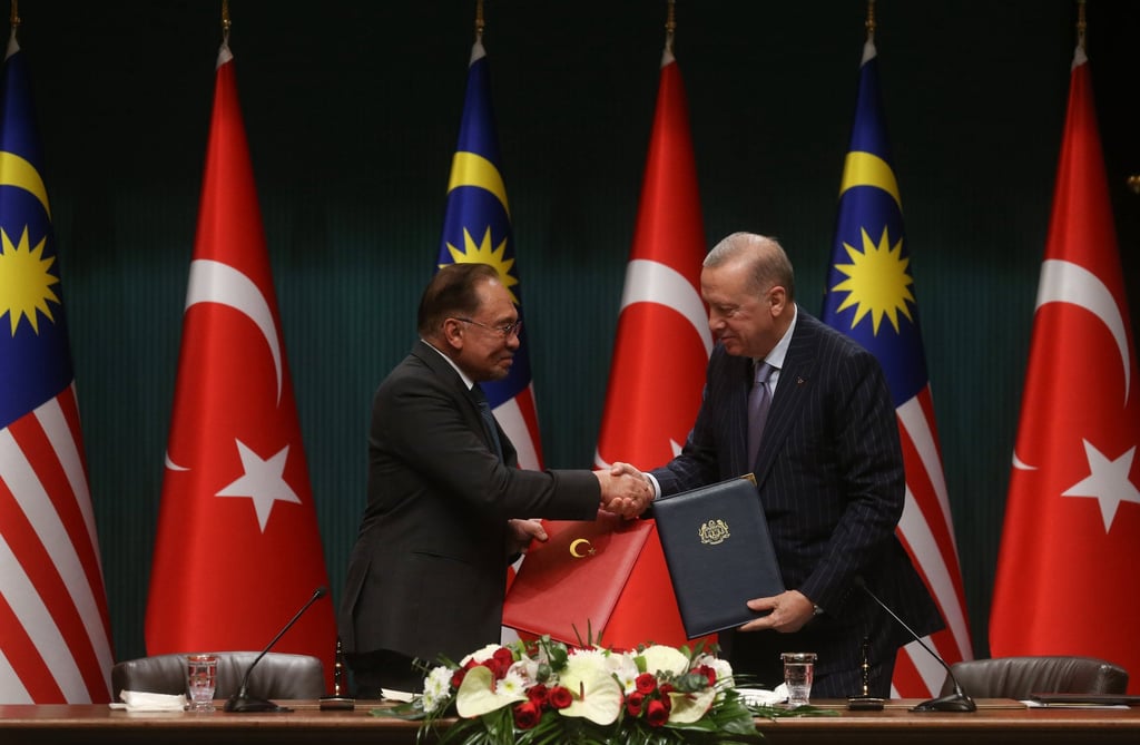 Malaysian Prime Minister Anwar Ibrahim (left) and Turkish President Recep Tayyip Erdogan shake hands as they formalise agreements in Ankara, Turkey, on January 7. Photo: Xinhua Malaysian Prime Minister Anwar Ibrahim (left) and Turkish President Recep Tayyip Erdogan shake hands as they formalise agreements in Ankara, Turkey, on January 7. Photo: Xinhua