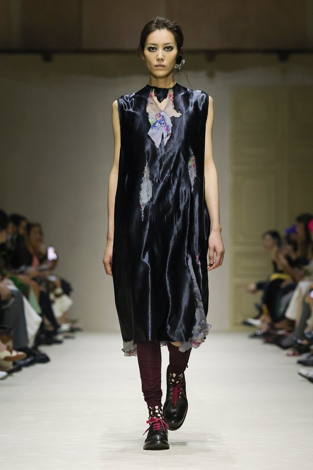 Prada’s runway saw models like Liu Wen with softly smeared liner and bare skin that embraced undone elegance. Photo: Handout