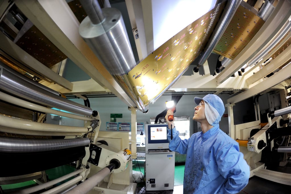 An employee works on a production line at a pharmaceutical packaging manufacturer in Lianyungang, Jiangsu province, on December 16, 2024. Photo: Xinhua An employee works on a production line at a pharmaceutical packaging manufacturer in Lianyungang, Jiangsu province, on December 16, 2024. Photo: Xinhua