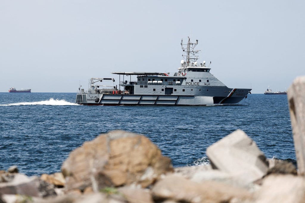 A Royal Oman Police Coast Guard patrol boat surveys the area in Muscat, Oman, as traffic is down in the Strait of Hormuz. Photo: Reuters