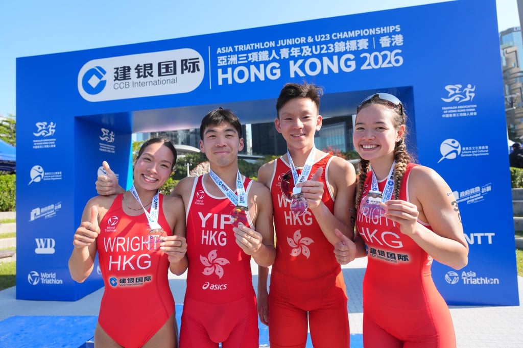 Cade Wright, Nick Yip, Andy Wong and Tallulah Wright show off their relay bronze medals. Photo: Karma Lo