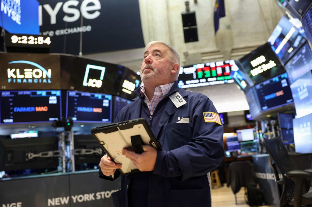 A trader works on the floor of the New York Stock Exchange on Wednesday. Photo: AFP