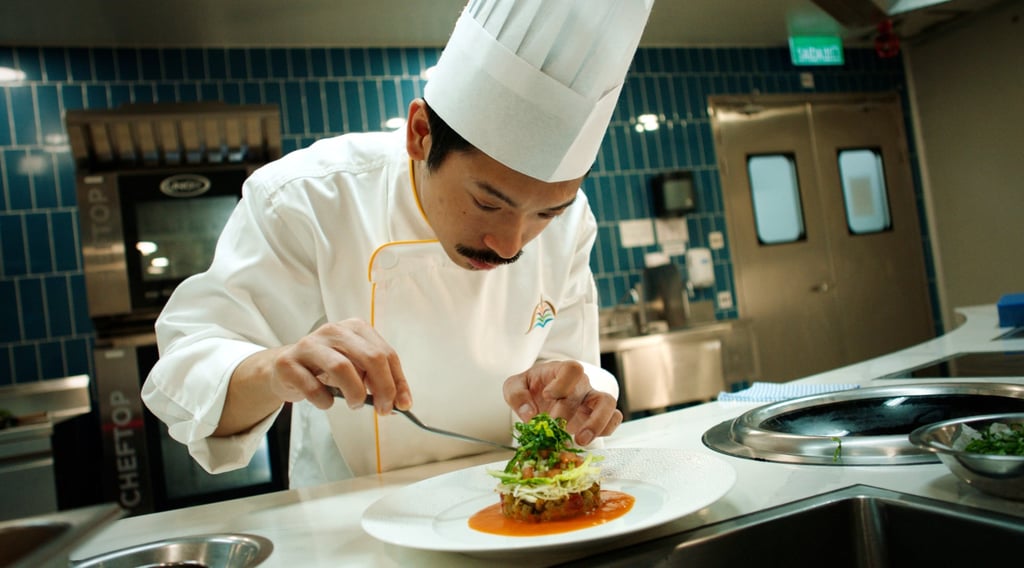 Daniel Chio, a sous chef at Galaxy Macau, creates his dish using vegetables grown at Macau Urban Farm.