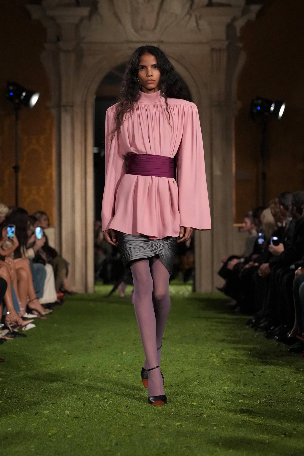 A model sporting a satin cummerbund at the Valentino fall/winter 2026 show. Photo: Handout