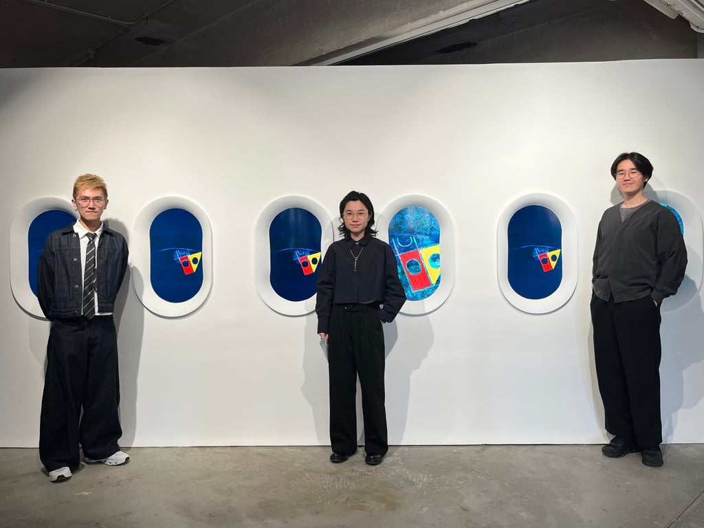 Artist Florence Lee (centre), curator Danson Wong (left) and exhibition producer Jackson Kwong stand in front of Lee’s Where Sight Sinks into Starlit Eyes. Photo: Enid Tsui
