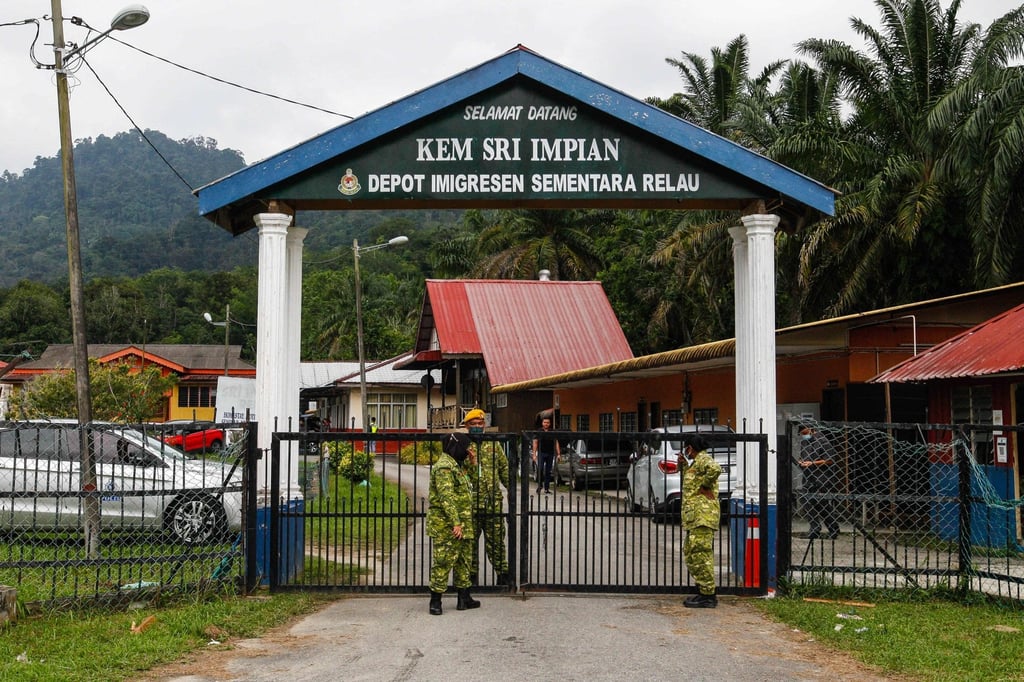 Malaysia’s paramilitary volunteers guard the main gate of the Malaysian Immigration’s temporary Sungai Bakap depot in Penang in 2022. Photo: AFP