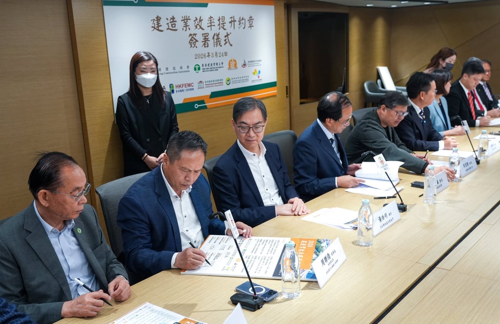 Leading groups in the construction industry sign the charter in Wan Chai on Tuesday. Photo: Eugene Lee Leading groups in the construction industry sign the charter in Wan Chai on Tuesday. Photo: Eugene Lee