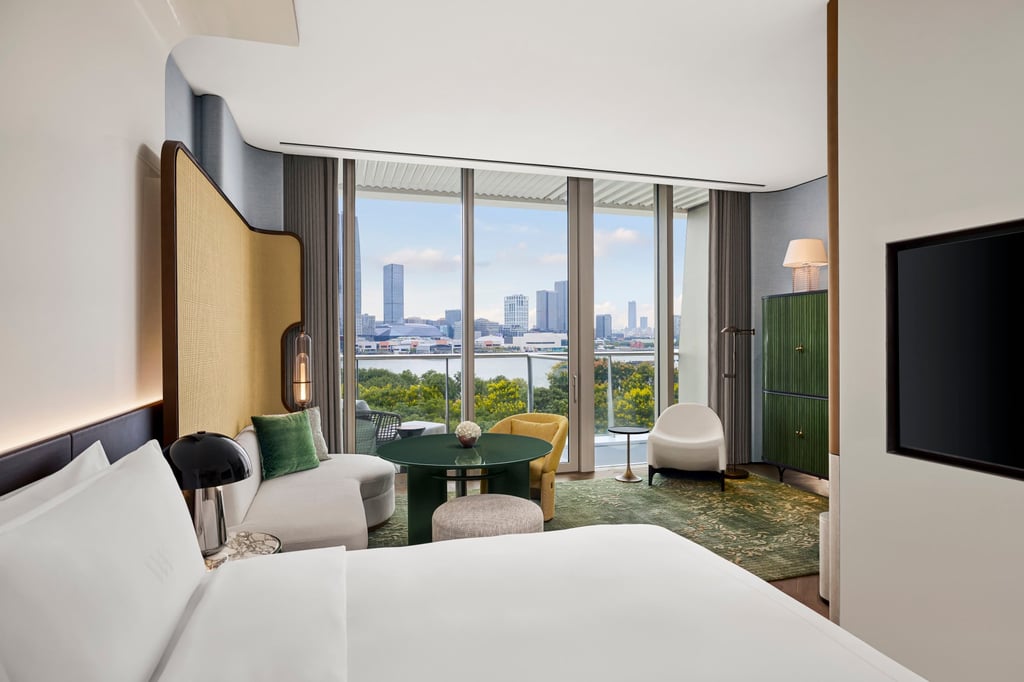 A bedroom overlooking the river and greenery. Photo: Handout