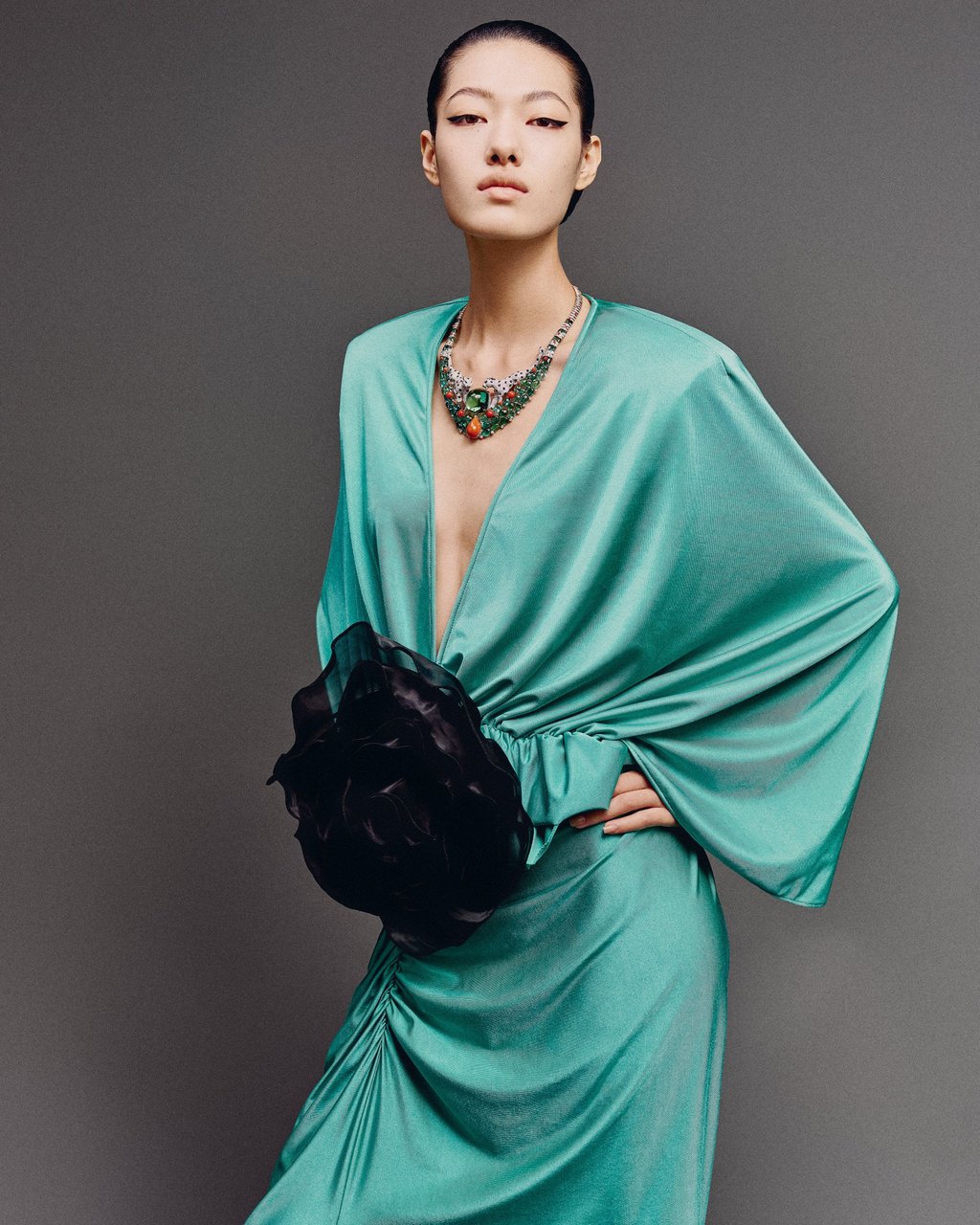 Necklace: Cartier. Dress: Jacques Wei