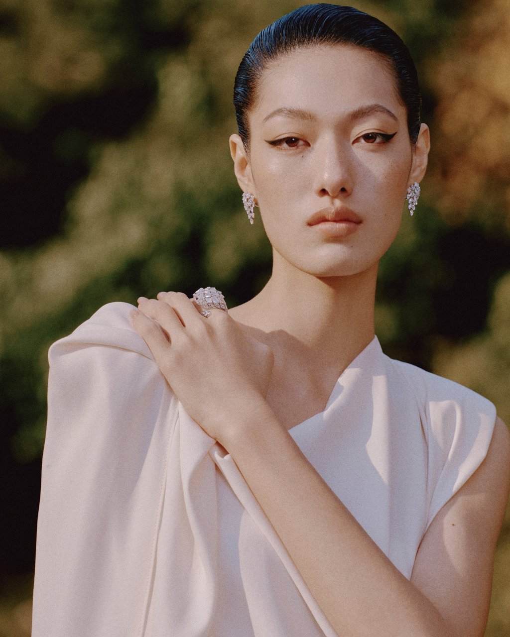 Earrings, ring: Cartier. Dress: Yoeyyou