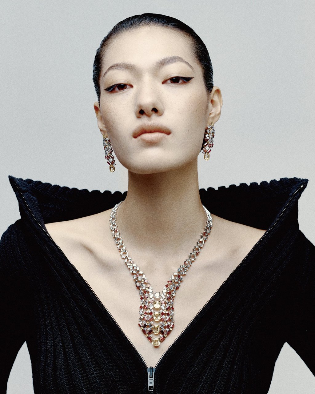 Necklace, earrings: Cartier. Top: Balenciaga