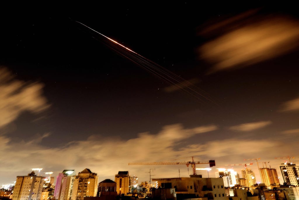 Rocket trails are seen in the sky amid a fresh barrage of Iranian missile attacks above the Israeli coastal city of Netanya. Photo: AFP Rocket trails are seen in the sky amid a fresh barrage of Iranian missile attacks above the Israeli coastal city of Netanya. Photo: AFP