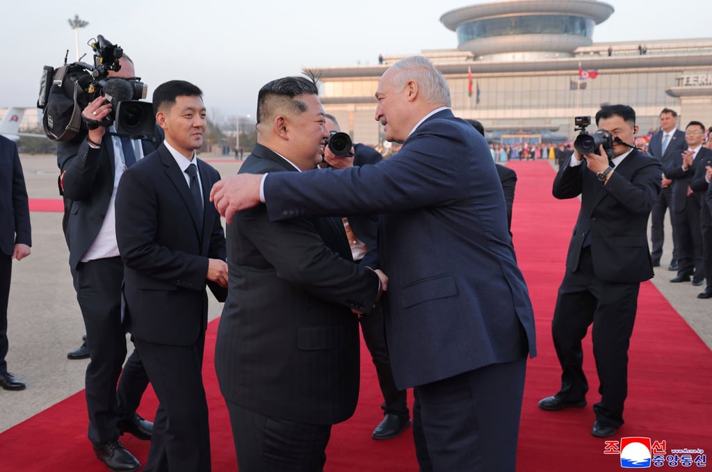 North Korea’s leader Kim Jong-un bids farewell to Belarus’ President Alexander Lukashenko at Pyongyang international airport on Thursday. Photo: KCNA via AP North Korea’s leader Kim Jong-un bids farewell to Belarus’ President Alexander Lukashenko at Pyongyang international airport on Thursday. Photo: KCNA via AP