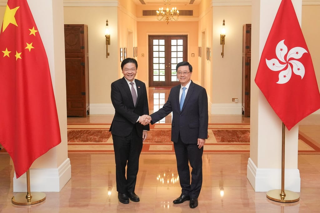 Singapore’s Lawrence Wong (left) met city leader John Lee at Government House. Photo: Elson Li