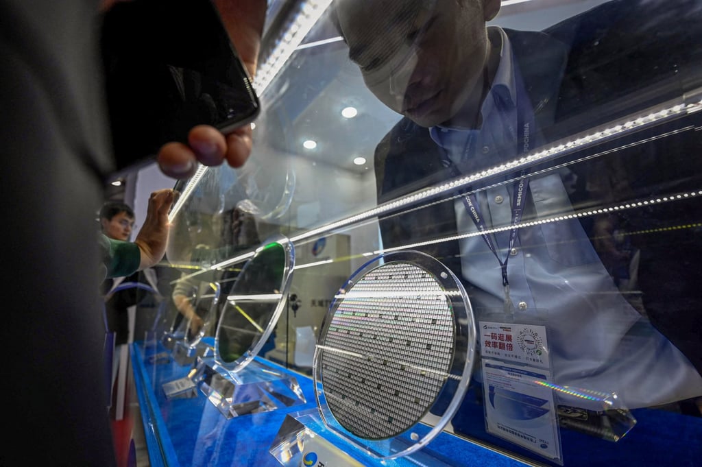 Wafer samples are on display at a semiconductor exhibition in Shanghai on March 25. Photo: AFP Wafer samples are on display at a semiconductor exhibition in Shanghai on March 25. Photo: AFP