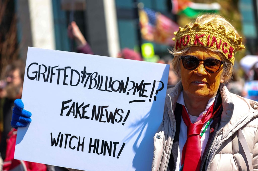 A protester in Washington takes part in the third nationwide “No Kings” protest on Saturday. Photo: AFP A protester in Washington takes part in the third nationwide “No Kings” protest on Saturday. Photo: AFP