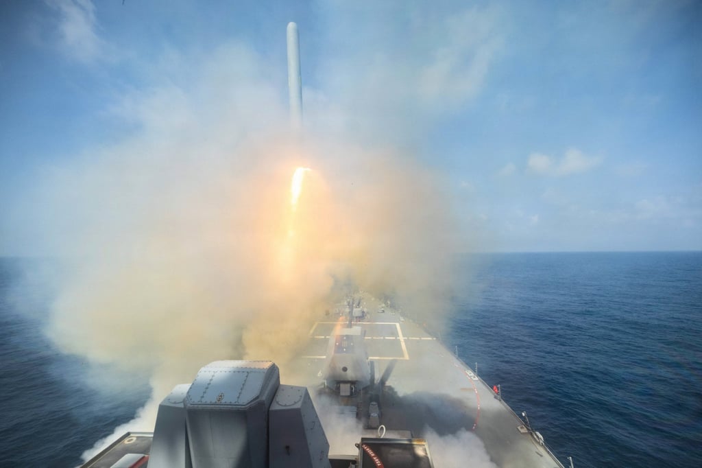 The Arleigh Burke-class guided-missile destroyer USS Spruance fires a Tomahawk missile at an undisclosed location on February 28. Photo: Handout