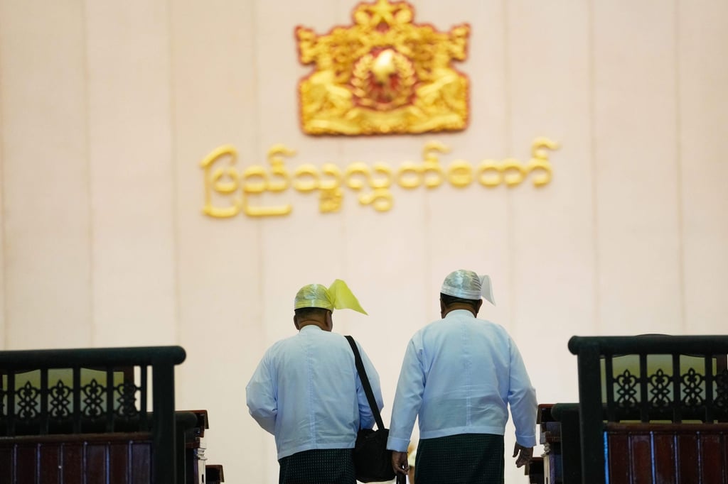 Myanmar lawmakers arrive to attend a session at Lower House of Parliament on Monday. Photo: AP