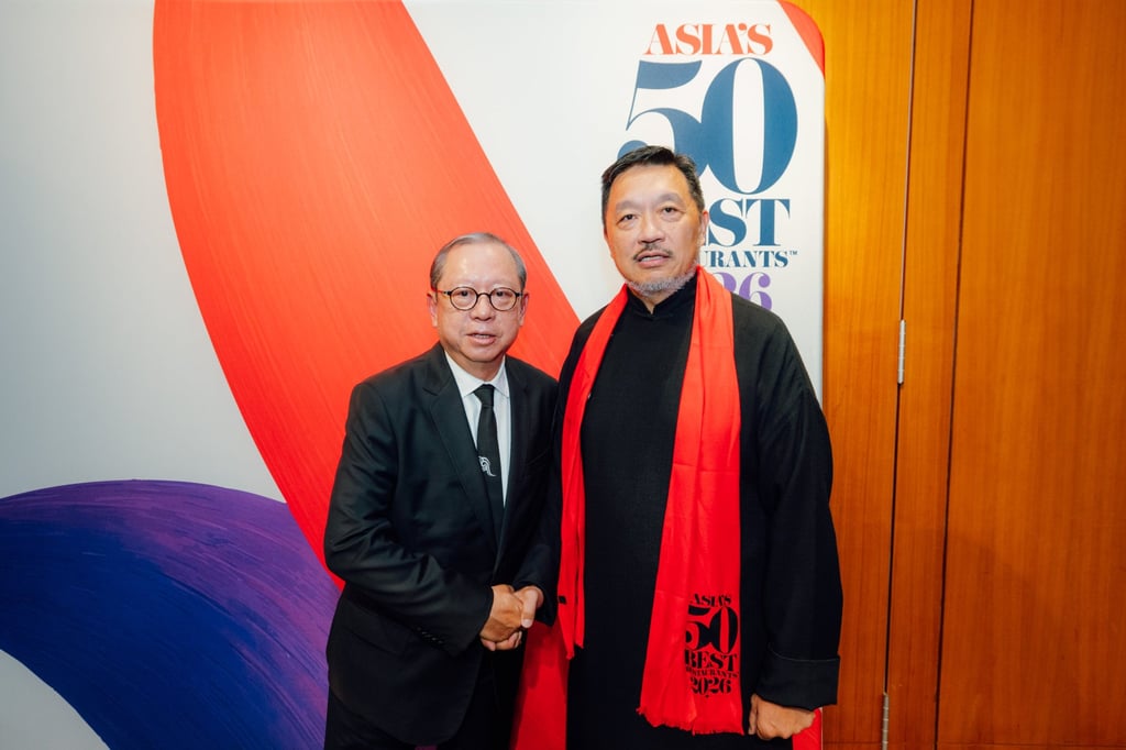 Peter Lam (left), chairman of the Hong Kong Tourism Board, congratulates Danny Yip, owner of The Chairman, on his establishment being named The Best Restaurant in Asia. Photo: HKTB Peter Lam (left), chairman of the Hong Kong Tourism Board, congratulates Danny Yip, owner of The Chairman, on his establishment being named The Best Restaurant in Asia. Photo: HKTB