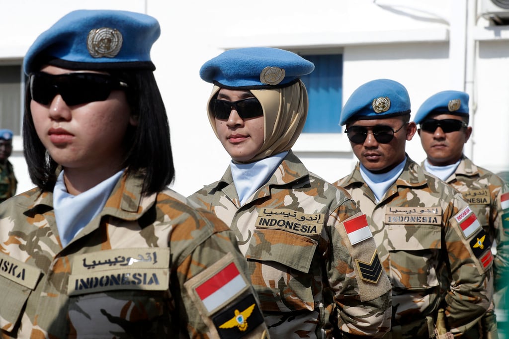 Indonesian peacekeepers, members of the United Nations Interim Force in Lebanon (UNIFIL), attend a ceremony at their headquarters in southern Lebanon in 2022. Photo: AFP Indonesian peacekeepers, members of the United Nations Interim Force in Lebanon (UNIFIL), attend a ceremony at their headquarters in southern Lebanon in 2022. Photo: AFP